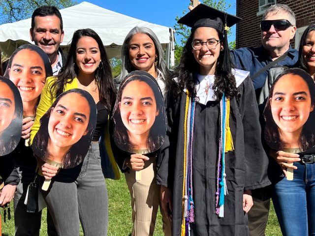 Danielly celebrates commencement with her family.