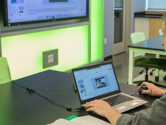 Dan works on a project inside Business Hall.