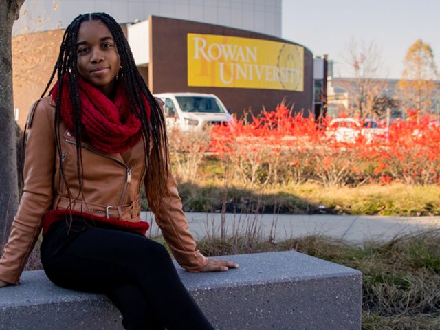 Aaliyah sits in Robinson green.