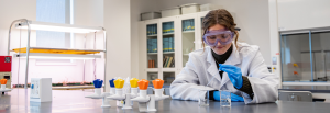 Rowan University Molecular and Cellular Biology major Lauren conducts research inside Discovery Hall.