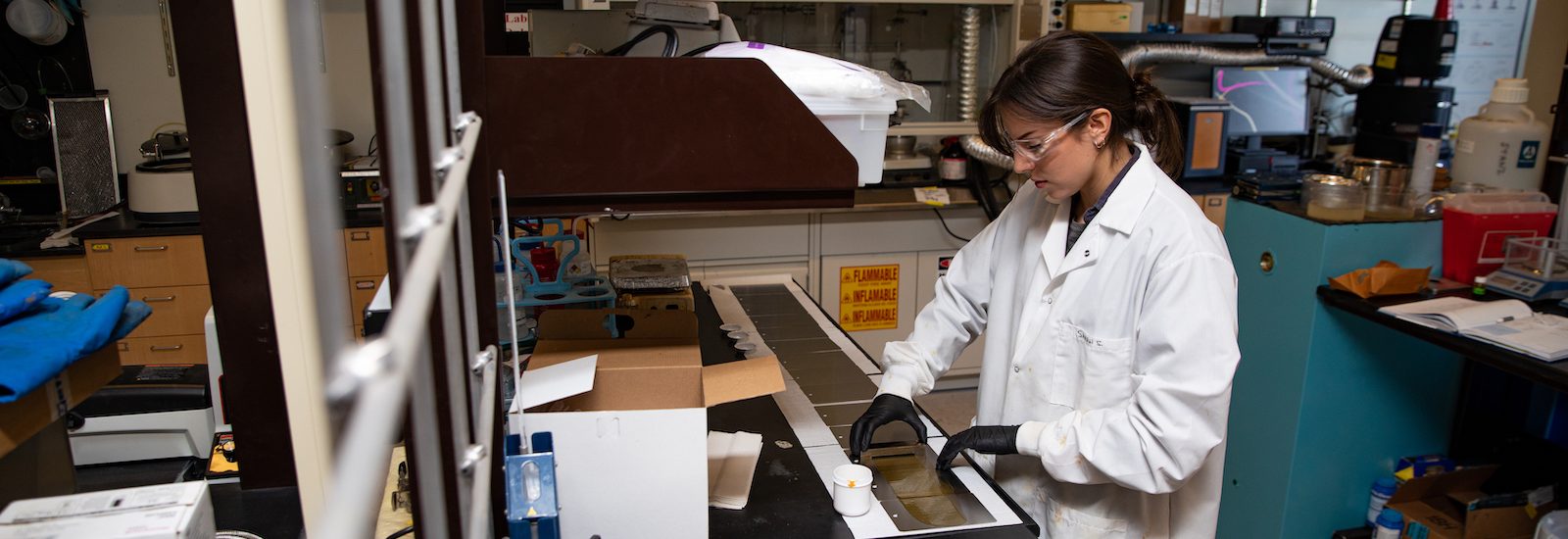 Sarah working in an engineering lab.