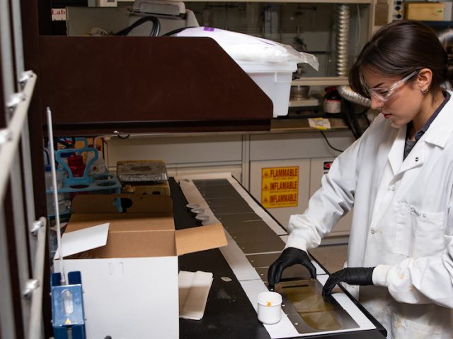 Sarah working in an engineering lab.