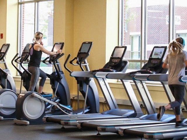 Rowan students running on the treadmills of the Fitness Center.