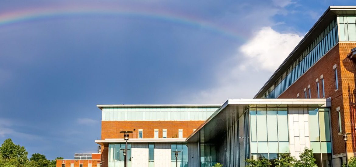 A rainbow in the sky over Business Hall.