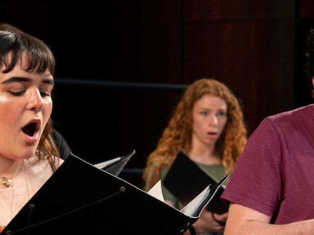 Close up of two singers at the concert choir.