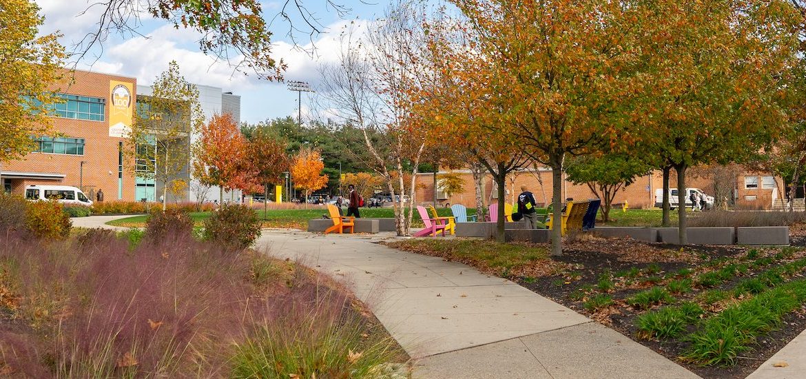A campus beauty photo showing bright autumn colors on Rowan University's campus.