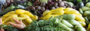 A stock image from Pexels showing a close up of a variety of densely packed fruits and vegetables.