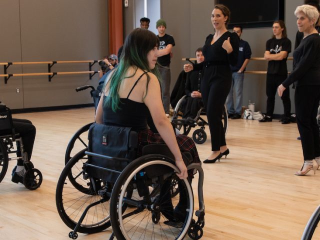 A Rowan University ballroom wheelchair-integrated class held inside of the Wilson Hall Dance Studios