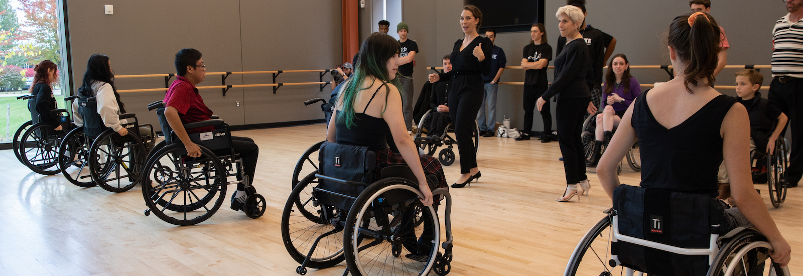 A Rowan University ballroom wheelchair-integrated class held inside of the Wilson Hall Dance Studios