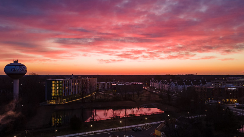 A look over campus with a vibrant sunset.