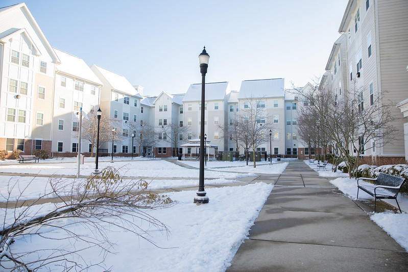 Snow view of campus apartments. 