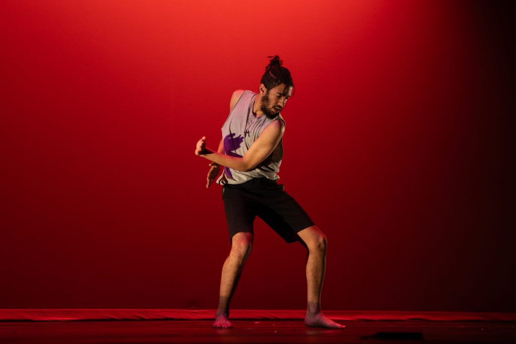 Company member Jackson Brown performing in his improvisation piece titled "Improvisation."