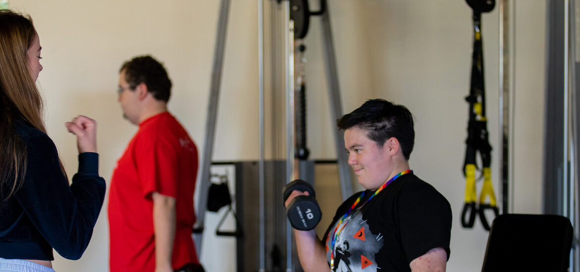 Students working inside of the exercise science laboratory inside of James Hall.