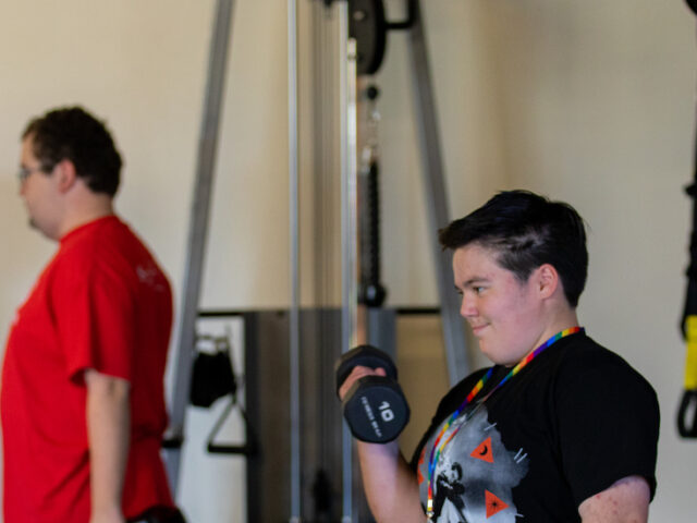 Students working inside of the exercise science laboratory inside of James Hall.