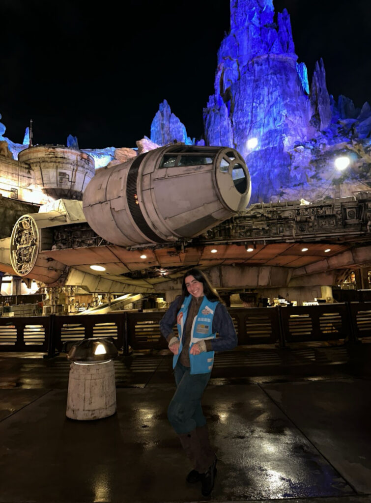 Sydney standing in front of the Millennium Falcon in Disney's Hollywood Studios.