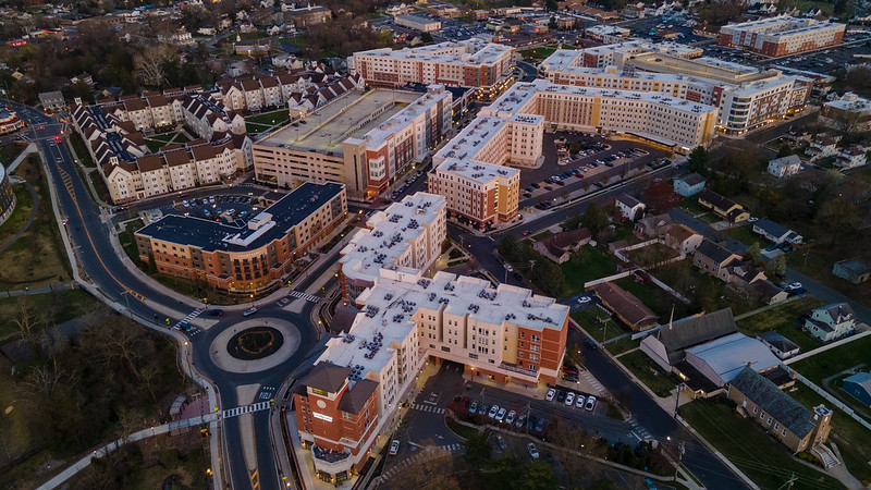 A drone view of above the Rowan Boulevard side of campus, which is an impressive view of new buildings and community. 