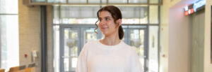 Daria Sapova in the lobby of the Rohrer College of Business.