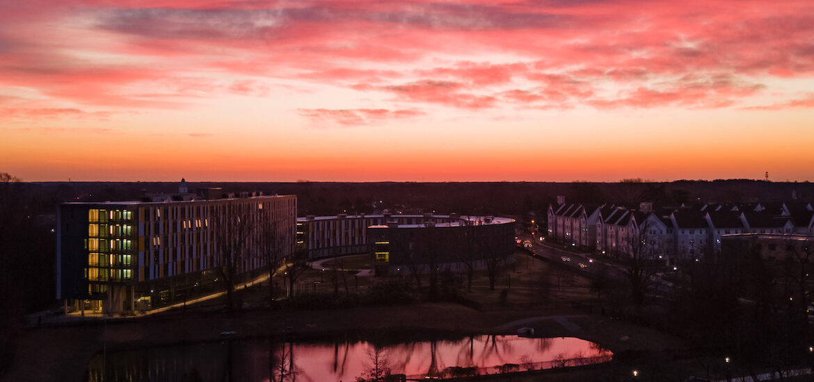 Sunrise at Rowan University over Holly Pointe Commons and the Rowan Boulevard Apartments