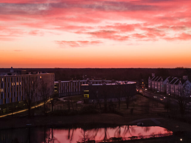 Sunrise at Rowan University over Holly Pointe Commons and the Rowan Boulevard Apartments