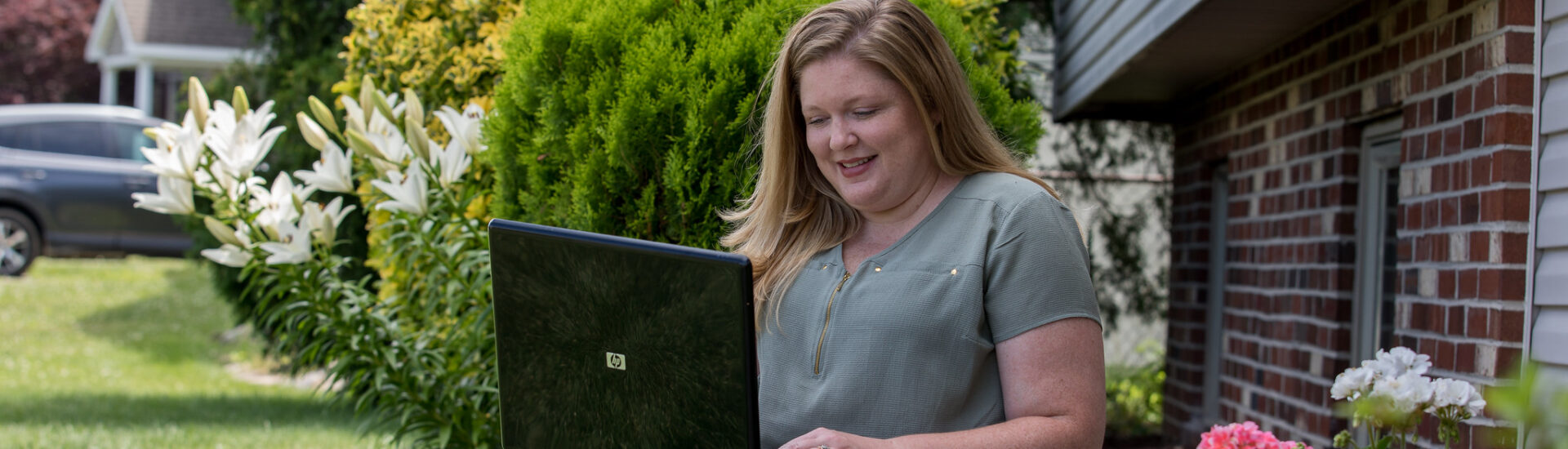 Working professional pursuing an online MBA program from home, balancing career and education.