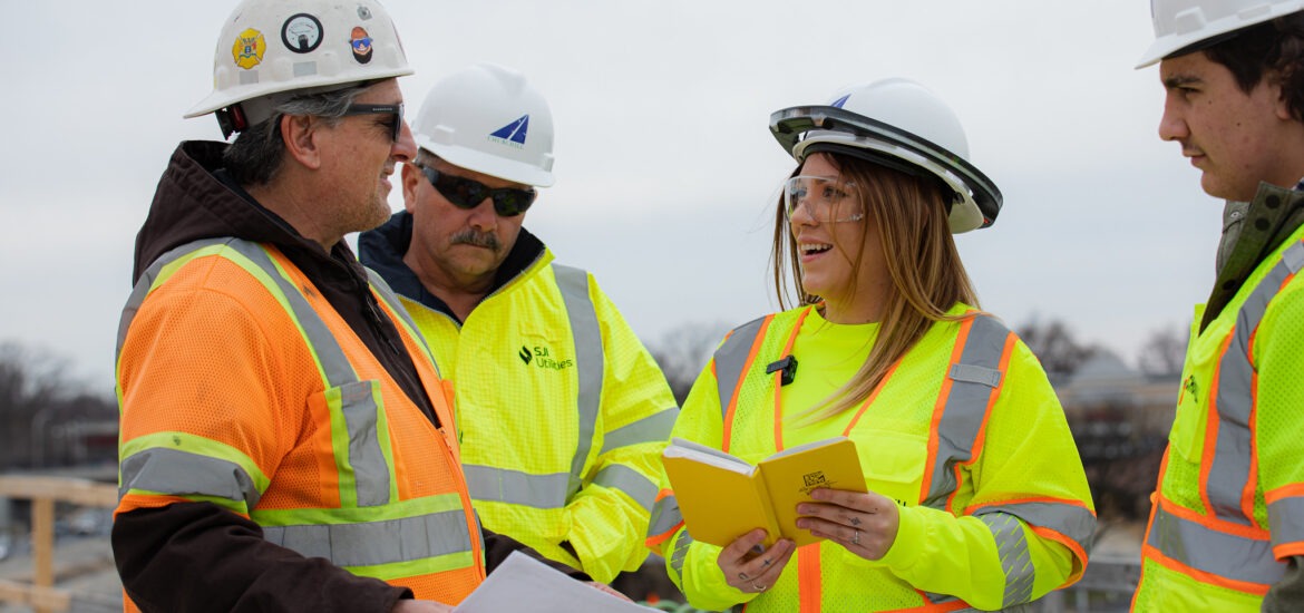 Students gaining hands-on experience in an online construction management degree program