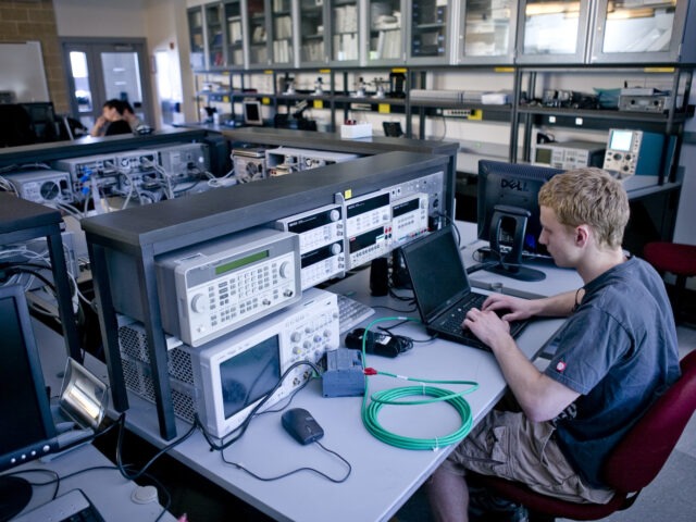 Student on computer pursuing his online masters in cyber security