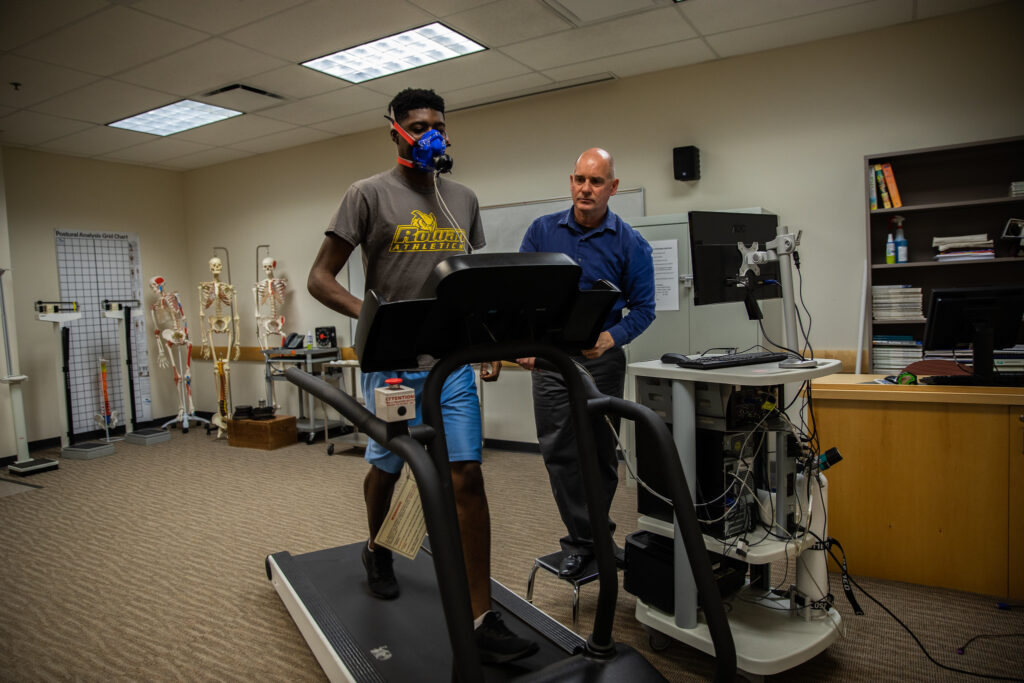 Student participating in an online respiratory therapy program, undergoing a respiratory assessment on a treadmill at Rowan University