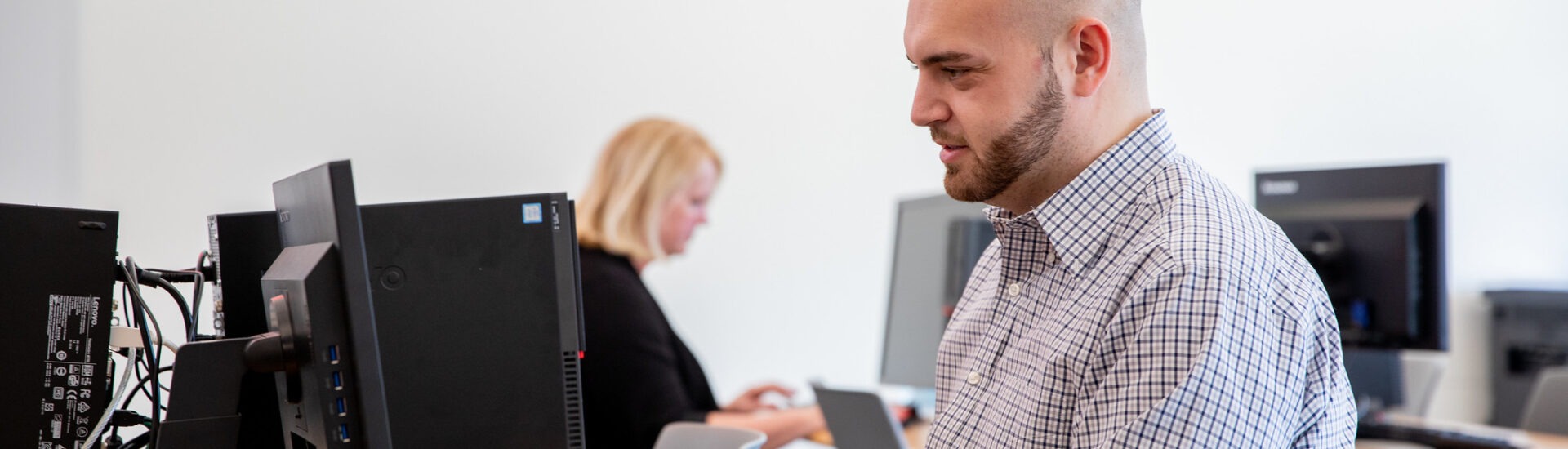 Student working on a healthcare management degree online.