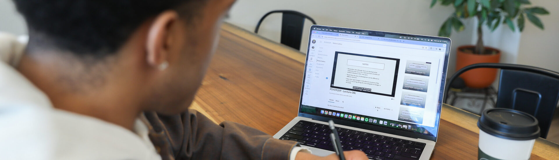 Bachelor of psychology student completing coursework for online program.