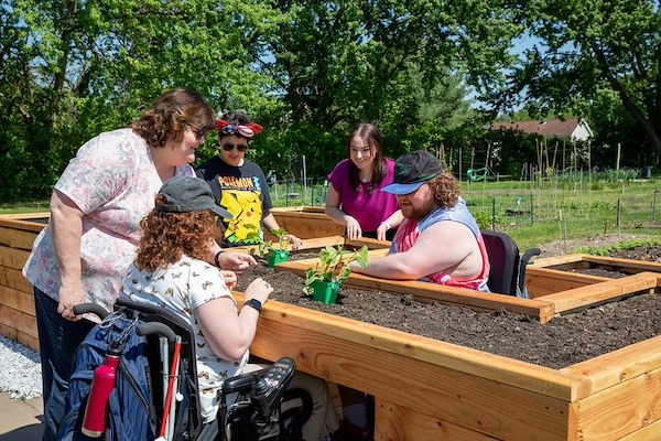 Rowan master's in special education graduates built this wheelchair accessible community garden of raised garden beds.