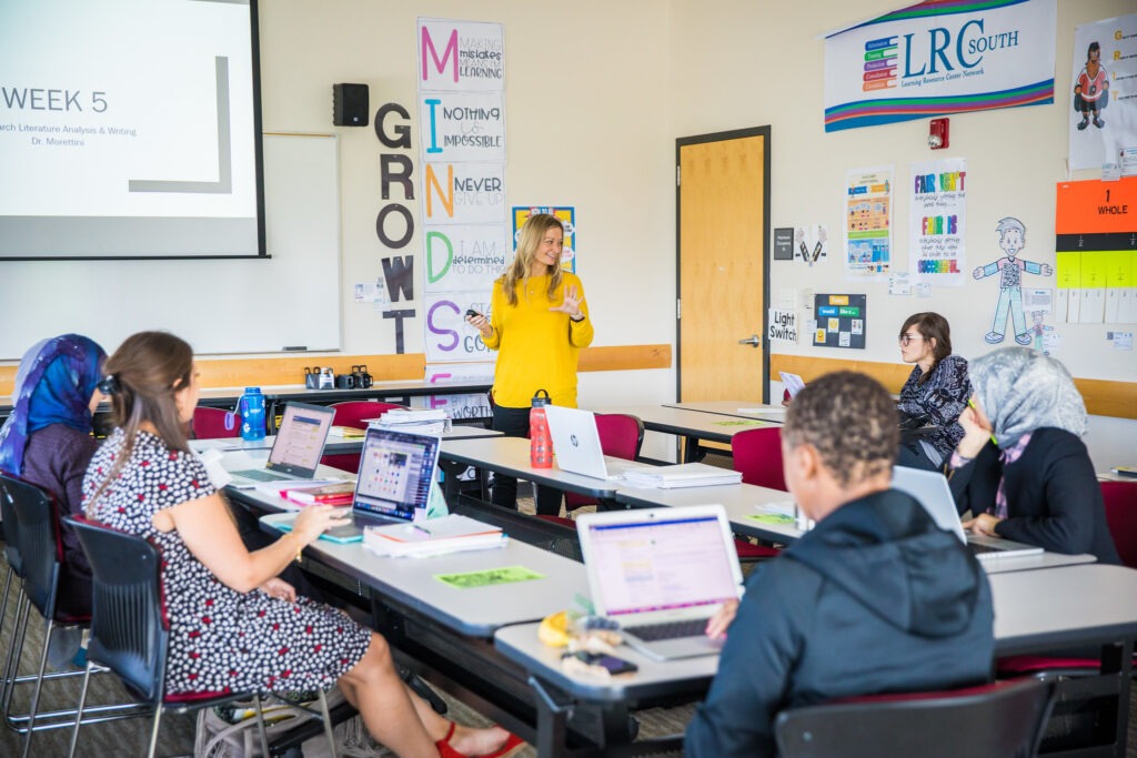 Educators participating in professional learning in a classroom, reflecting the value of the best online education master’s programs