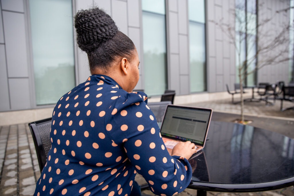 Student completing MBA online program through Rowan University