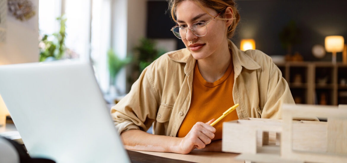 Prospective grad student googling "masters in engineering management vs mba" on computer.