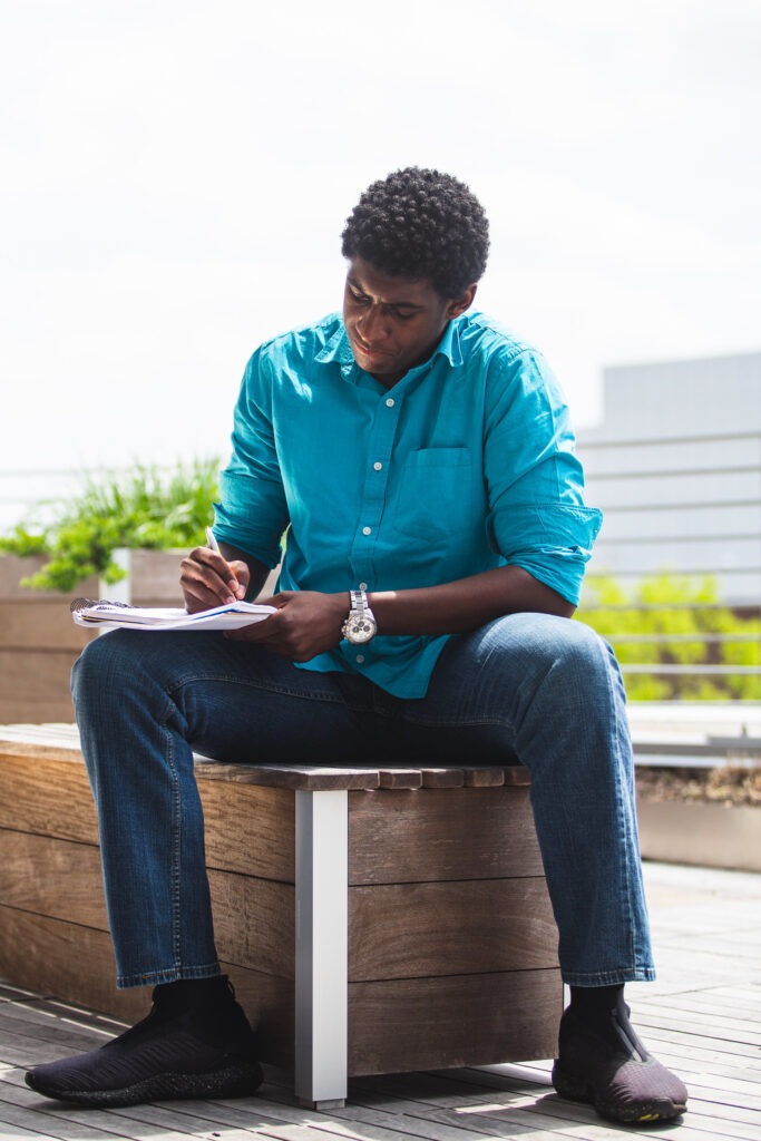 Student studying consumer behavior and market research as part of a psychology bachelor’s degree online, preparing for careers with a psychology online degree.