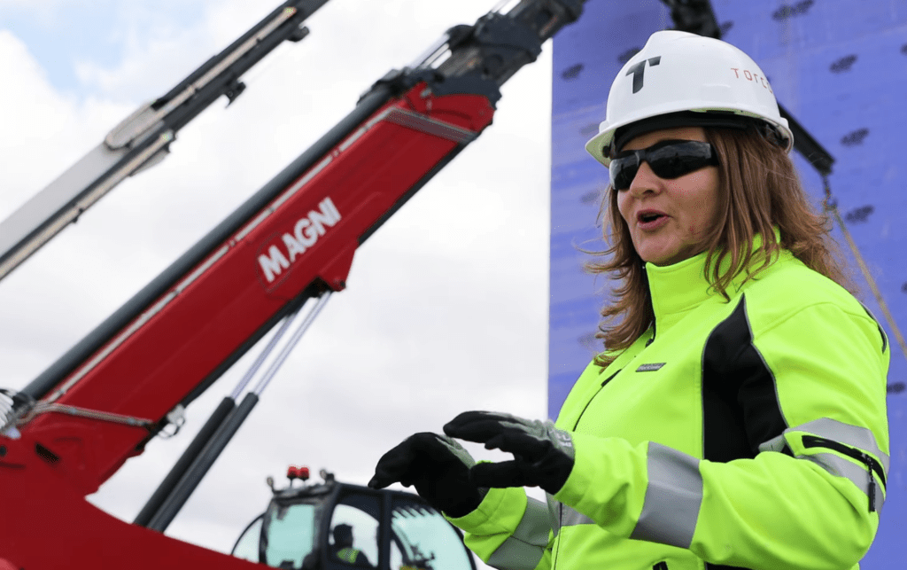Anna K., Rowan online construction management degree student out in the field working.
