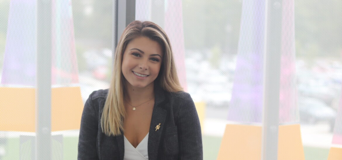 Smiling graduate student preparing for leadership roles through an MBA program with specialized concentrations.