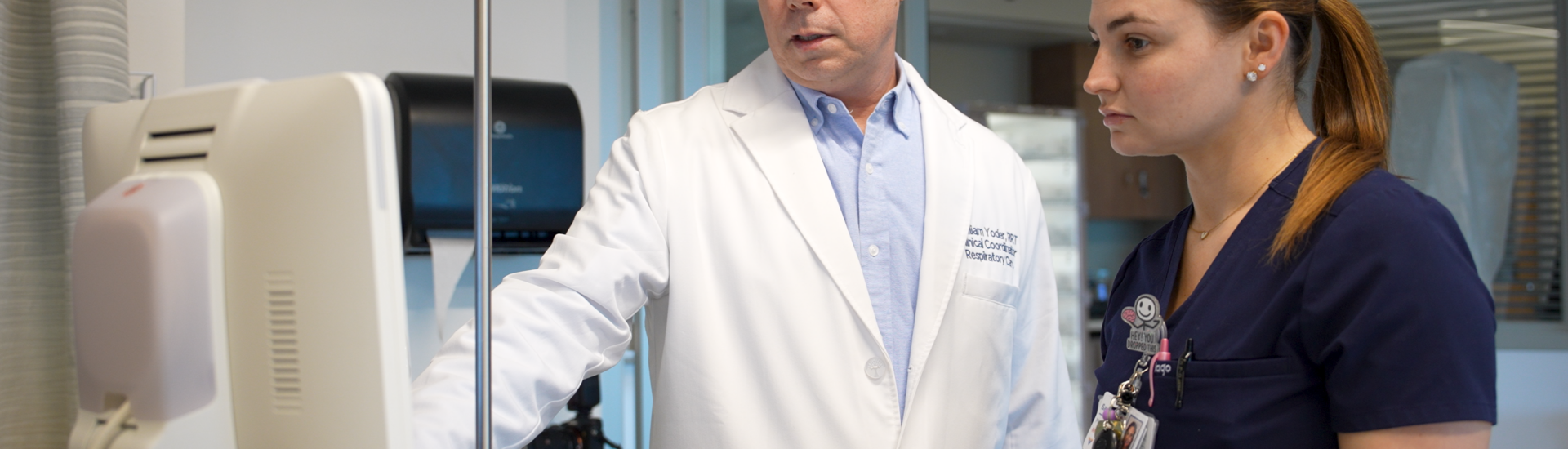 William Y., Clinical Coordinator at Virtua Health, mentoring a team member he oversees in the hospital setting.