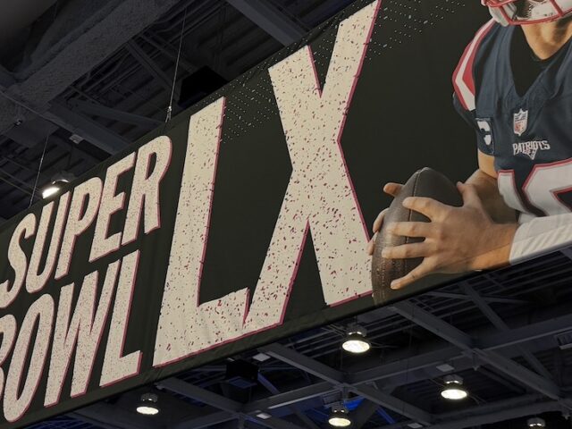 The convention center signage above guests' heads at Media Row ahead of the Super Bowl, froma Rowan sports communication and media student's perspective.