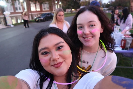 Julia takes a selfie with a friend on Rowan University's campus during the Field of Hope event. 