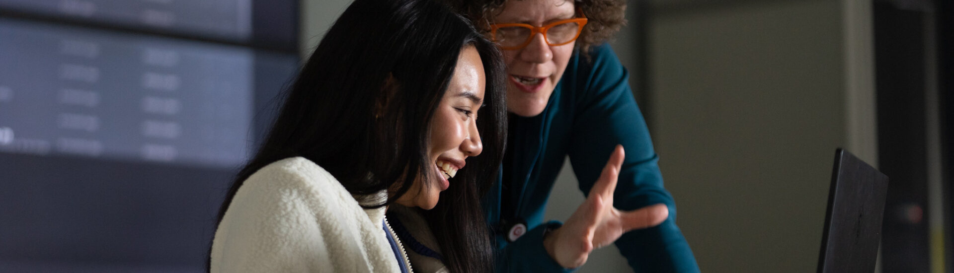 Rowan graduate student and professor interacting during a classroom lesson.